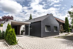 Die Architektin von Seipp Wohnen entwarf dieses schicke kleine Haus gemeinsam mit der Mitarbeiterin und Eigentümerin. Die Fassadenverkleidung aus Schiefer verleiht der Immobilie eine besondere Wirkung.